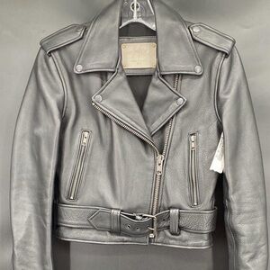 Understated Black Leather Motorcycle jacket belted zip pockets snaps RTL 395 XS